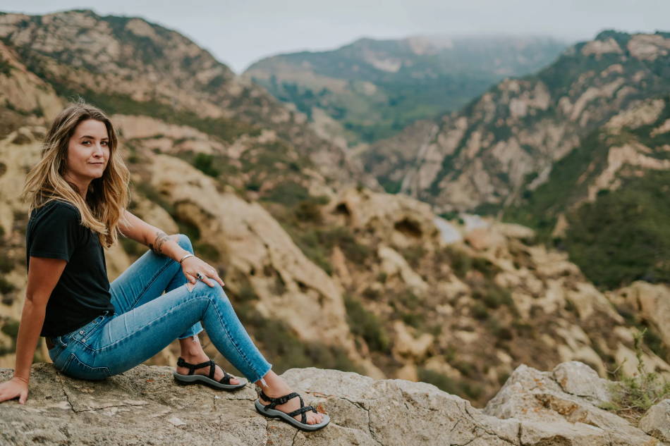 woman hiking with outdoors sandals