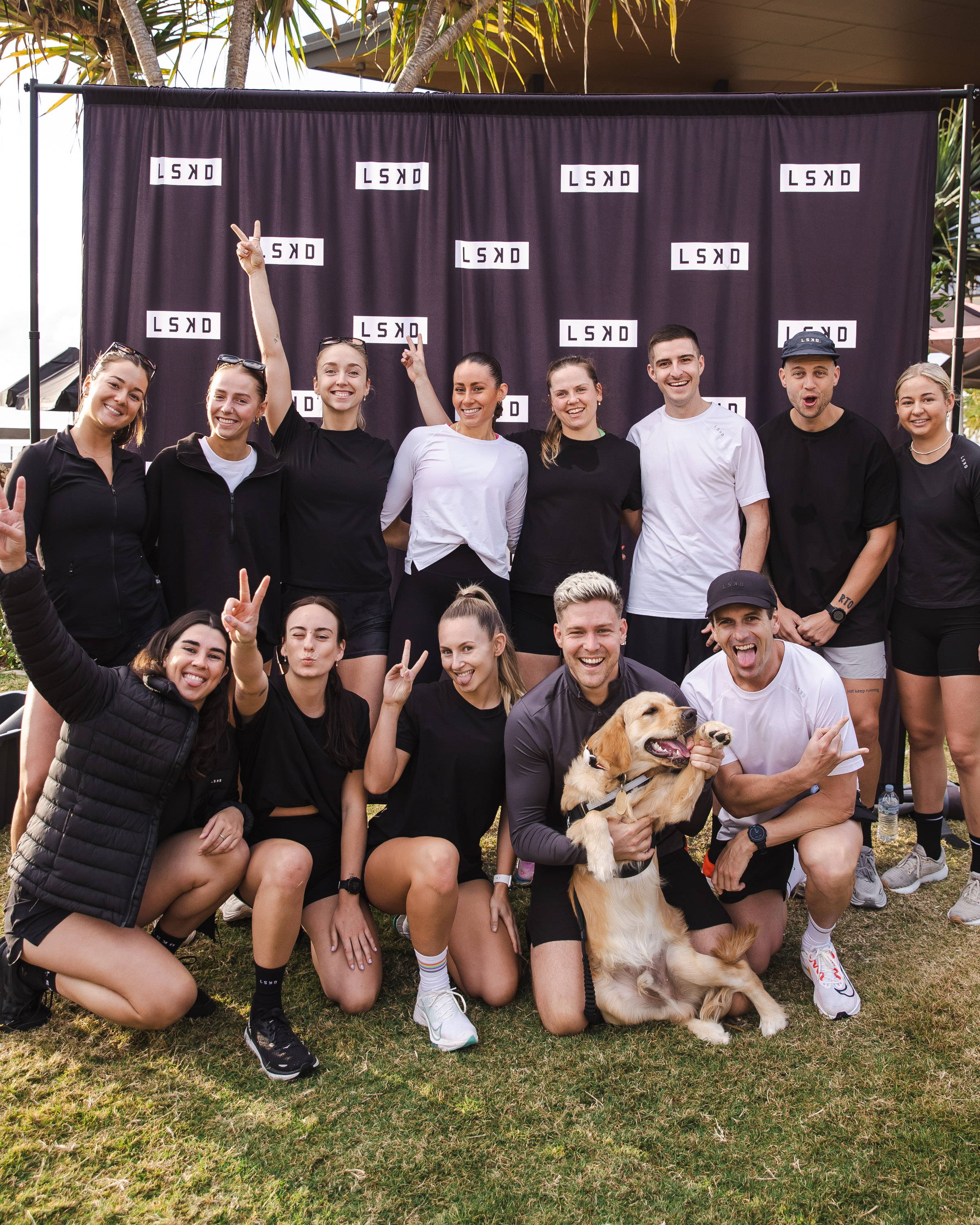 a group of people smiling for a photo for global run day 2023