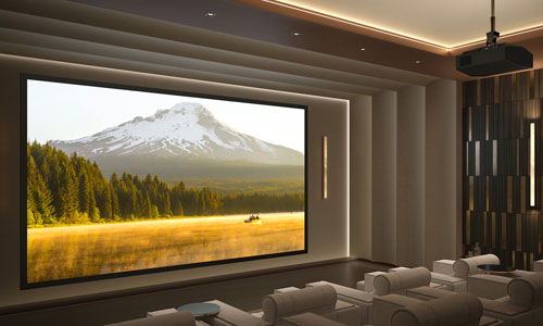 Home theater with a large screen displaying a mountain landscape.