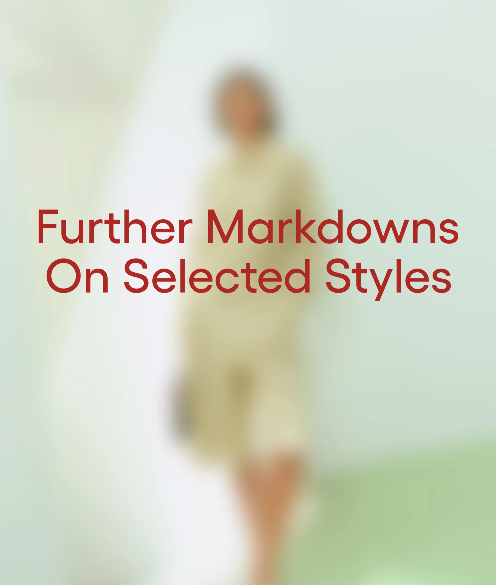 Text promoting markdowns on selected styles, with a blurred background.