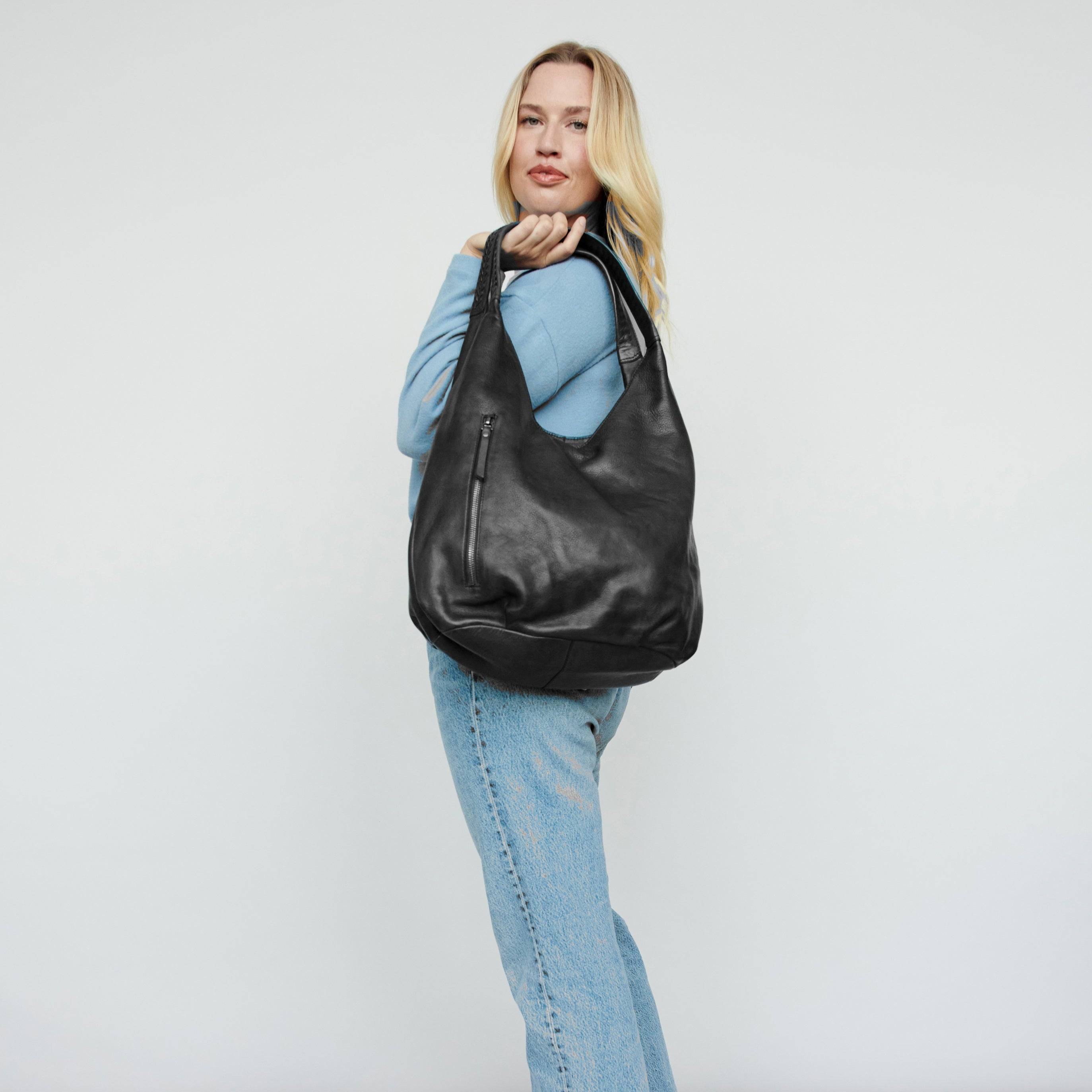 Camila shoulderbag is a gorgeous leather handbag  with multifunctional pockets