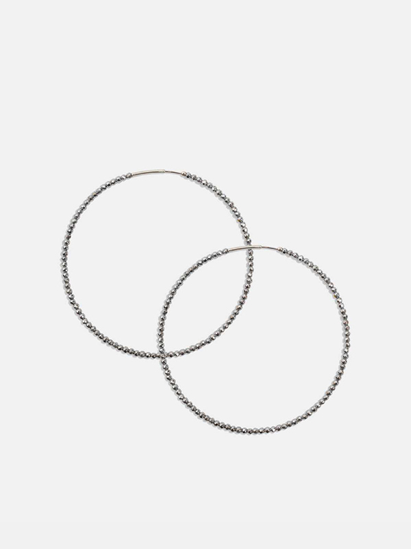 A product image of Saskia Diez sparkly large hoops in Silver Gunmetal.