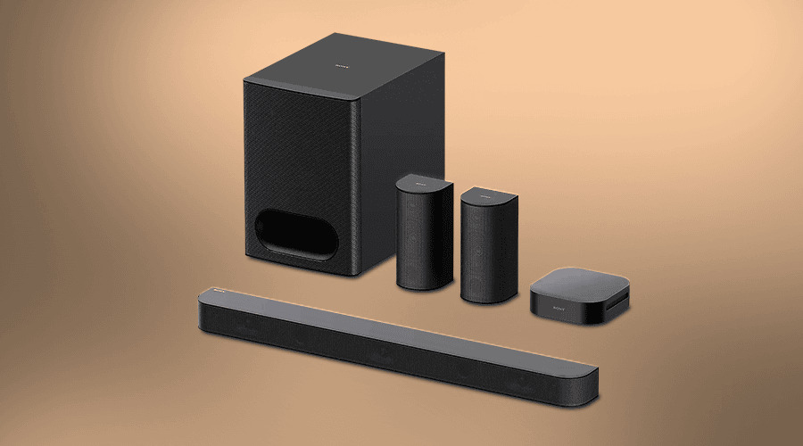 Black audio equipment set including soundbar, subwoofer, and speakers on a neutral background.