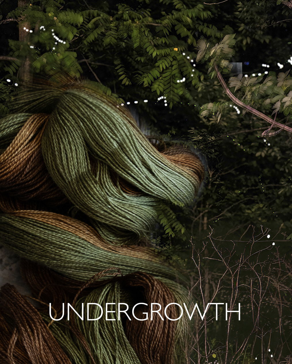 green and brown gradient yarn on a forest background