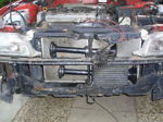 Dual black train horns mounted in front of radiator bumper removed 4A-FE engine Dennis's Toyota Corolla Conductor's Special 232 gallery photo 2