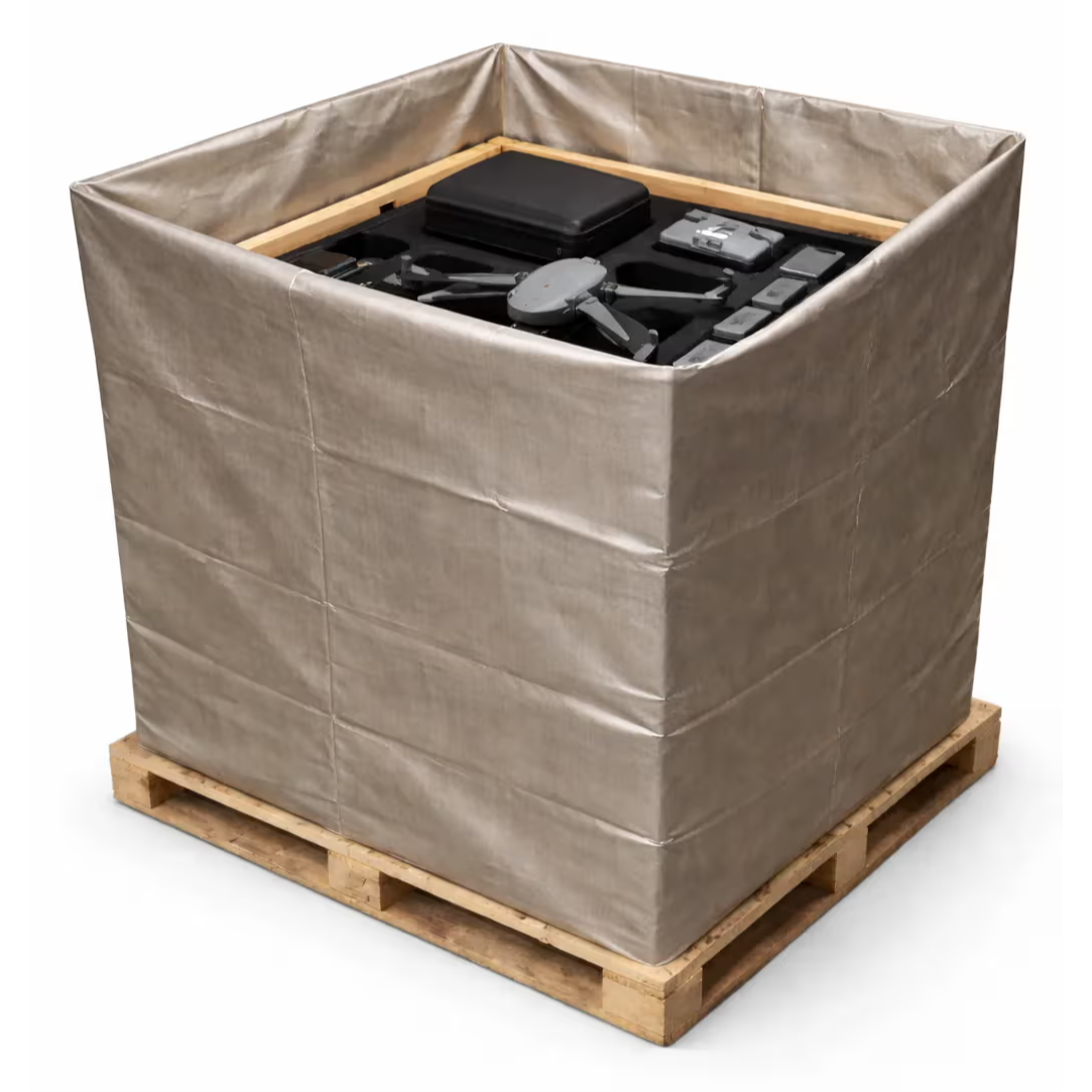 A square container on a wooden pallet filled with assorted items.