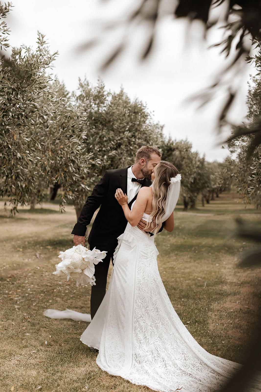 Bride and groom sharing a kiss