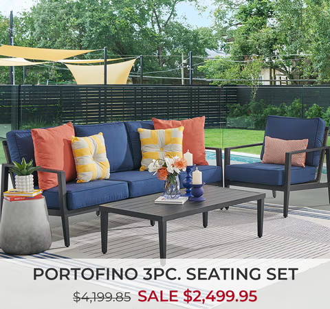 Outdoor seating set with cushions, table, and promotional pricing displayed.