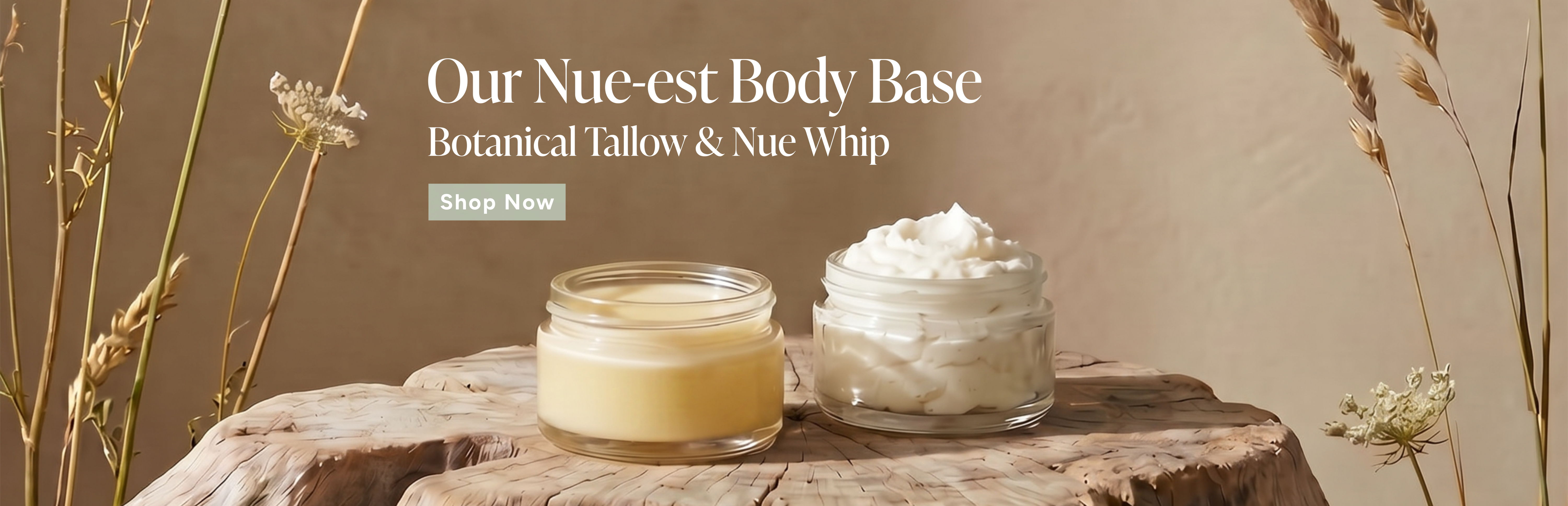 Two body creams displayed on a wooden surface with decorative elements.