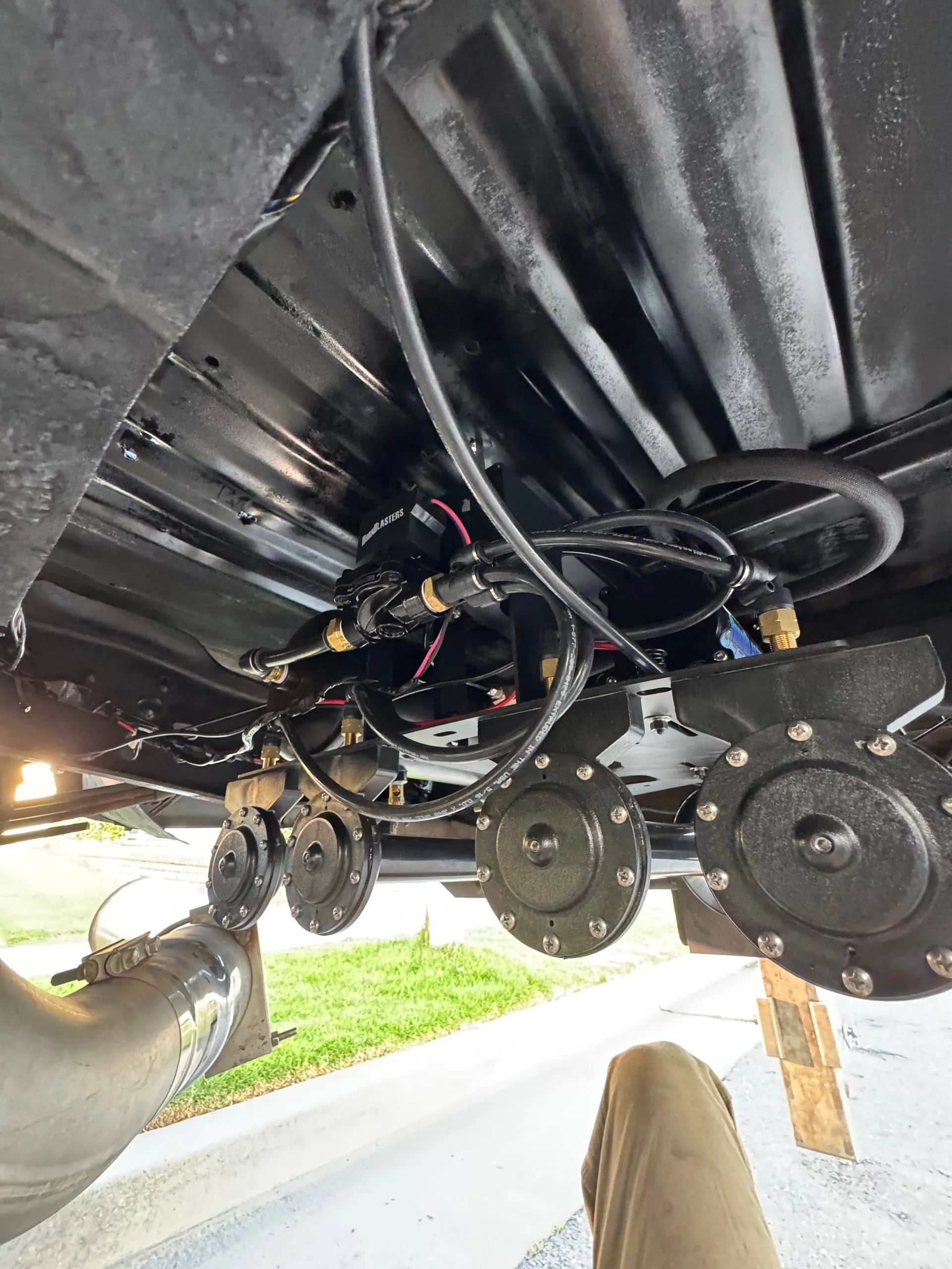HornBlasters four-disc train horn manifold mounted on the undercarriage of Noah's Ford F250