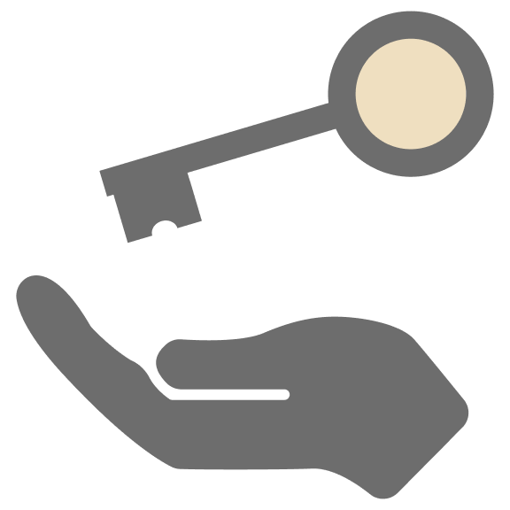 A hand holding a key, symbolizing access or security.