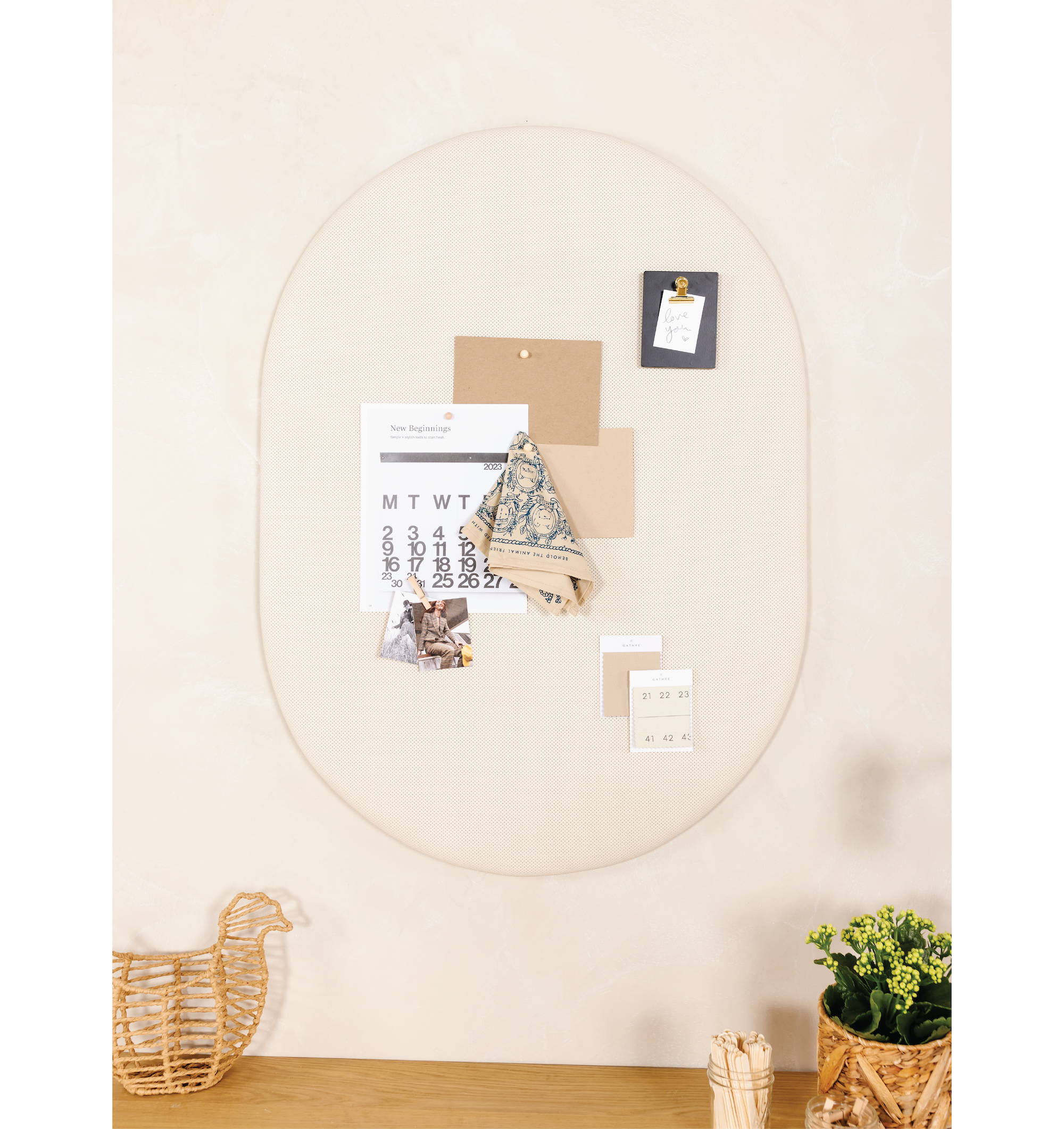 Pinboard in Ivory with papers and objects pinned to Pinboard