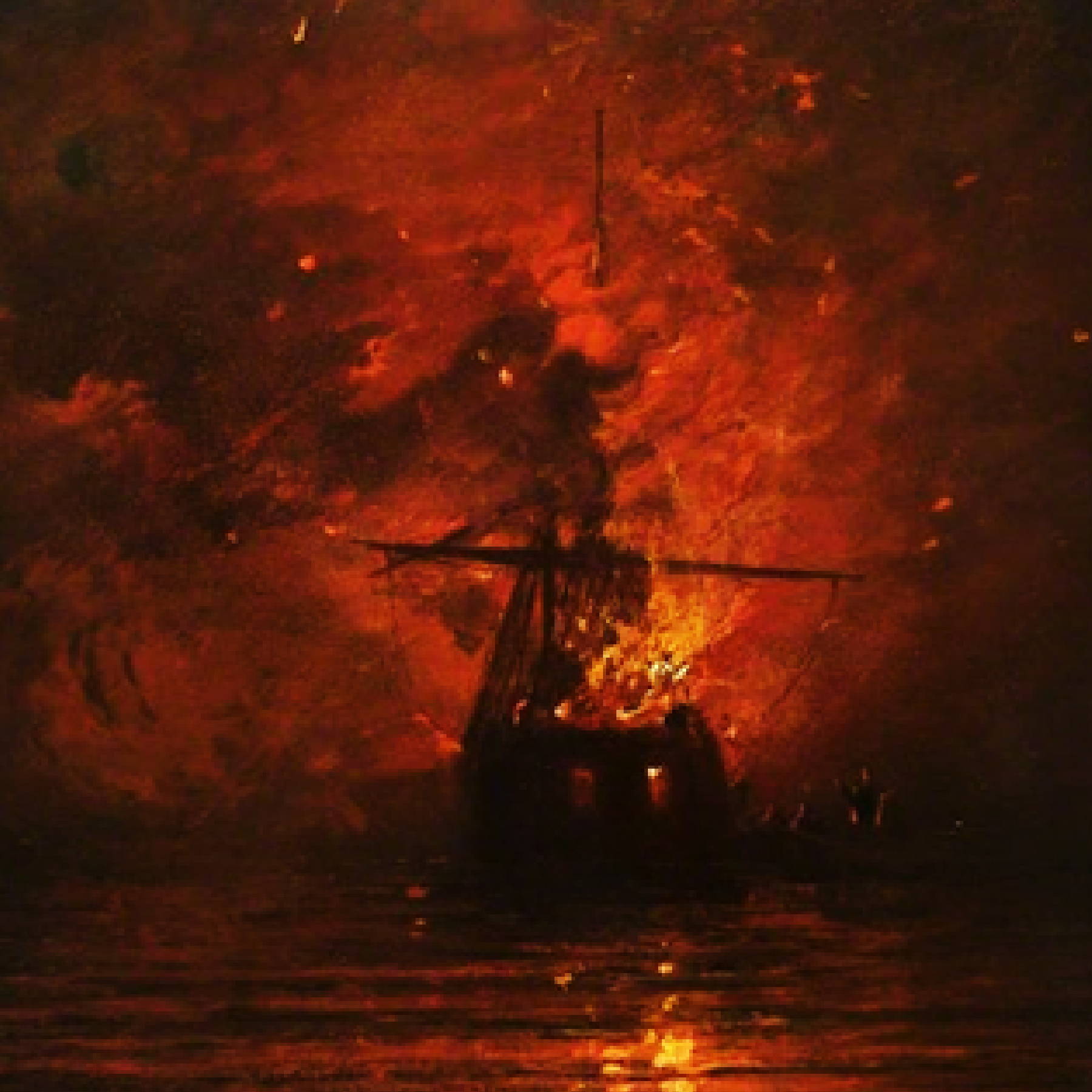 a ship on fire in the water