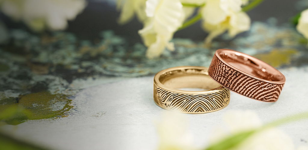 yellow and rose gold fingerprint rings