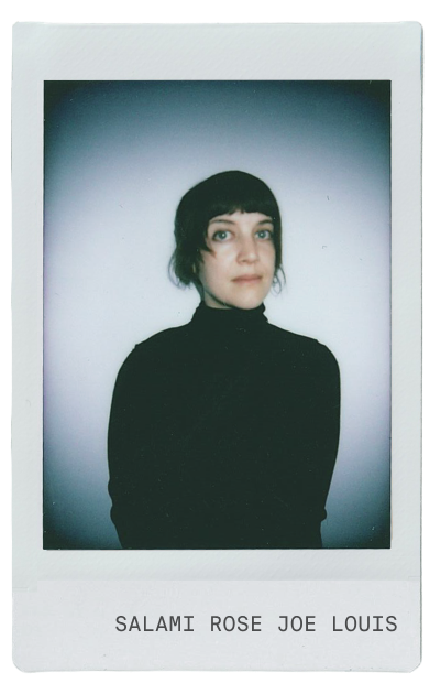 Portrait of a person with short hair in a black turtleneck.