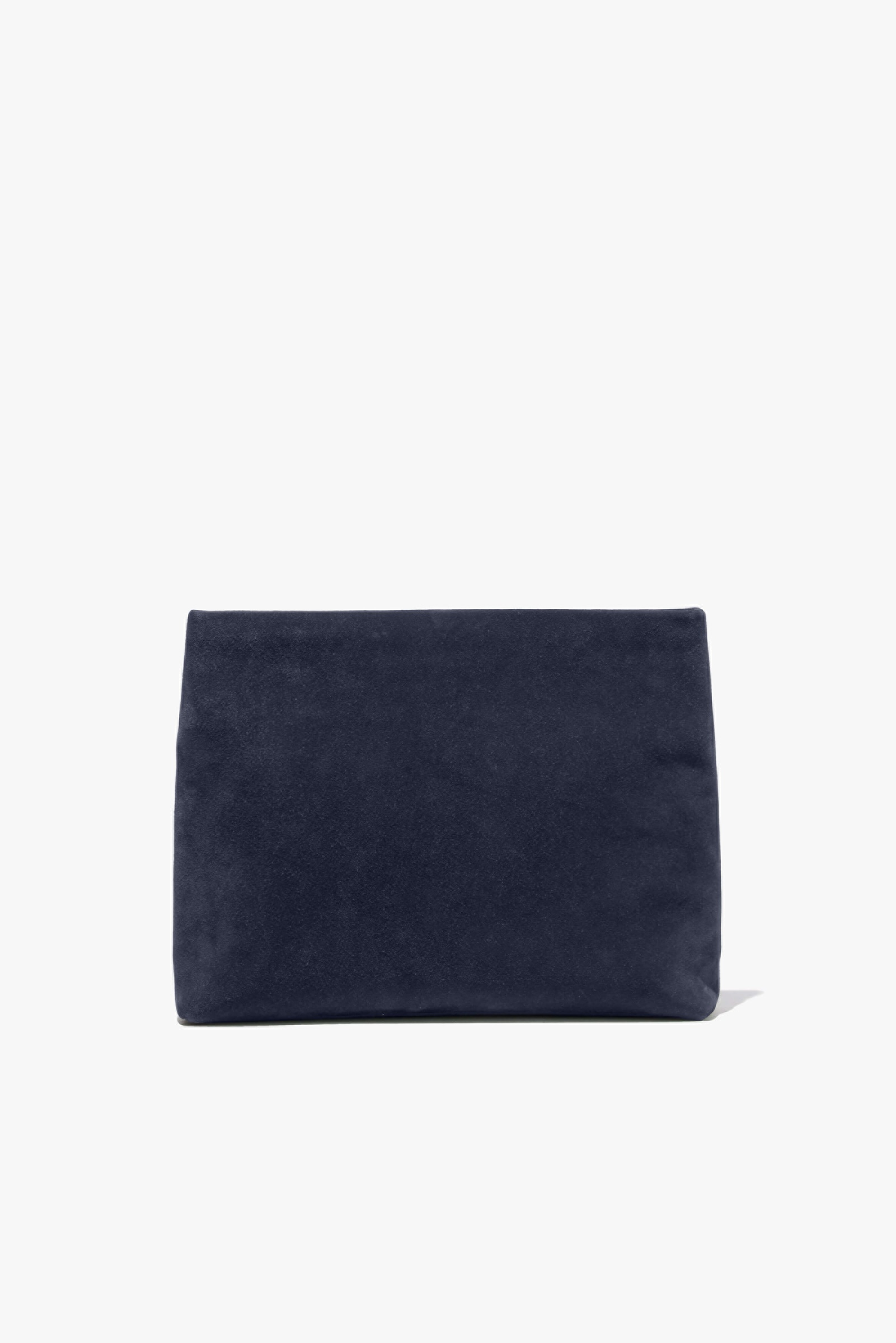 A simple navy blue clutch bag on a white background.