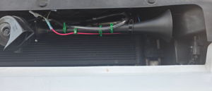 2016 Jeep Cherokee with HornBlasters Sniper Electric Horn behind the grille