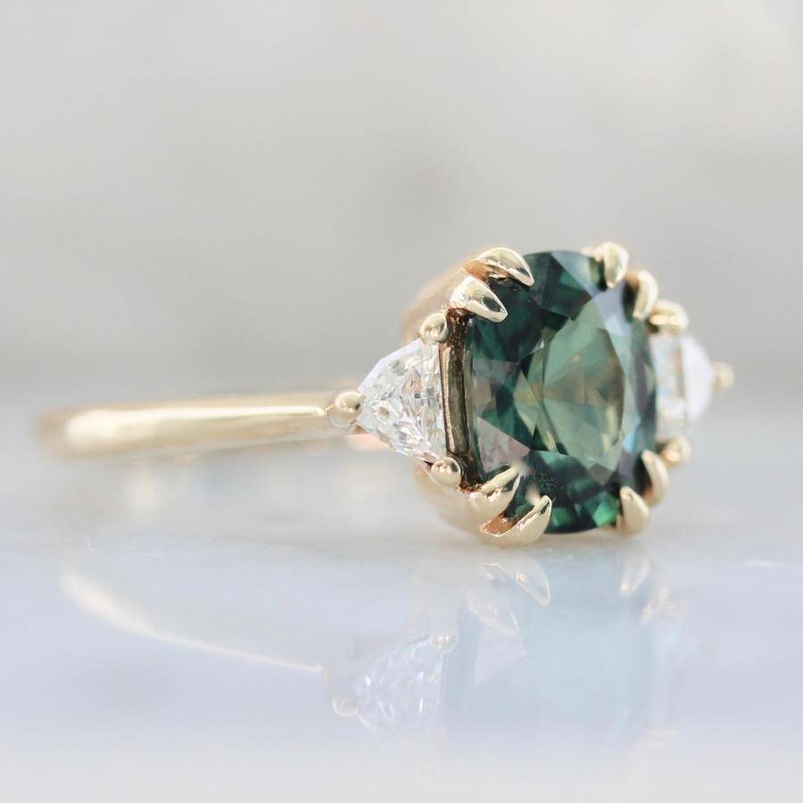 cushion cut green sapphire engagement ring with epaulette diamond sides