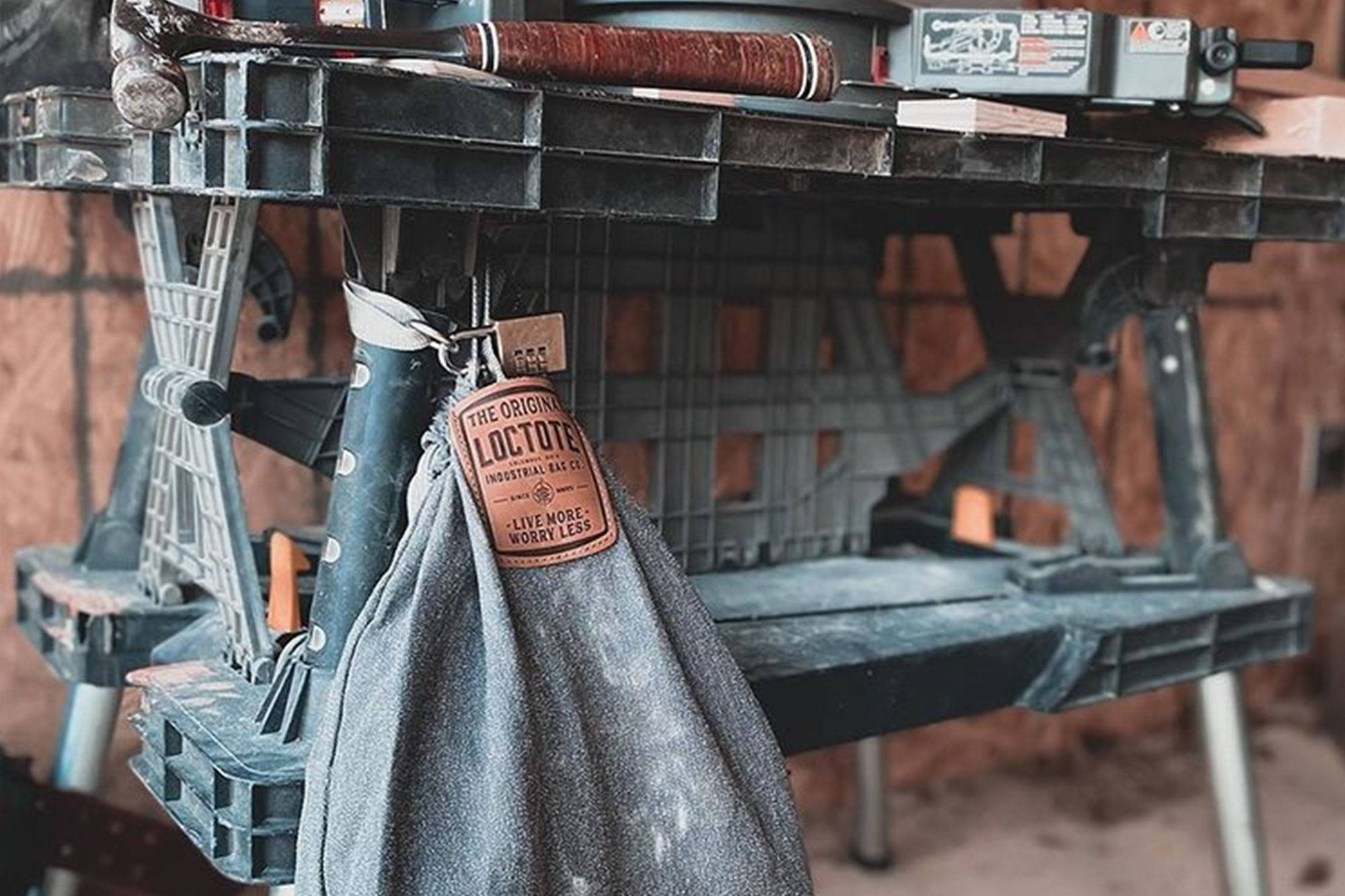 LOCTOTE lockable bag secured to tool bench