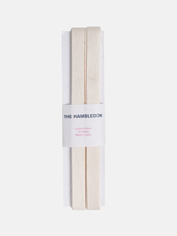 Pack of fabric ties with branding label.
