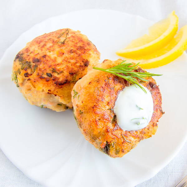 High Quality Organics Express two crab cakes with dill and basil and horseradish cream