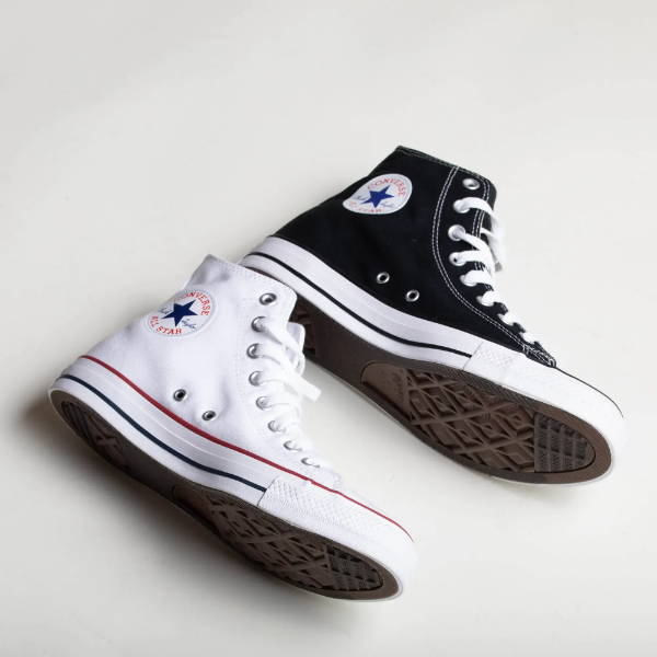 one black and one white converse
