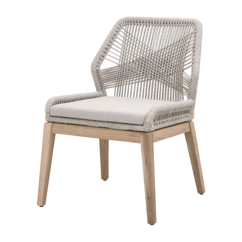A Mediterranean designed dining chair that has intricate loom weave.