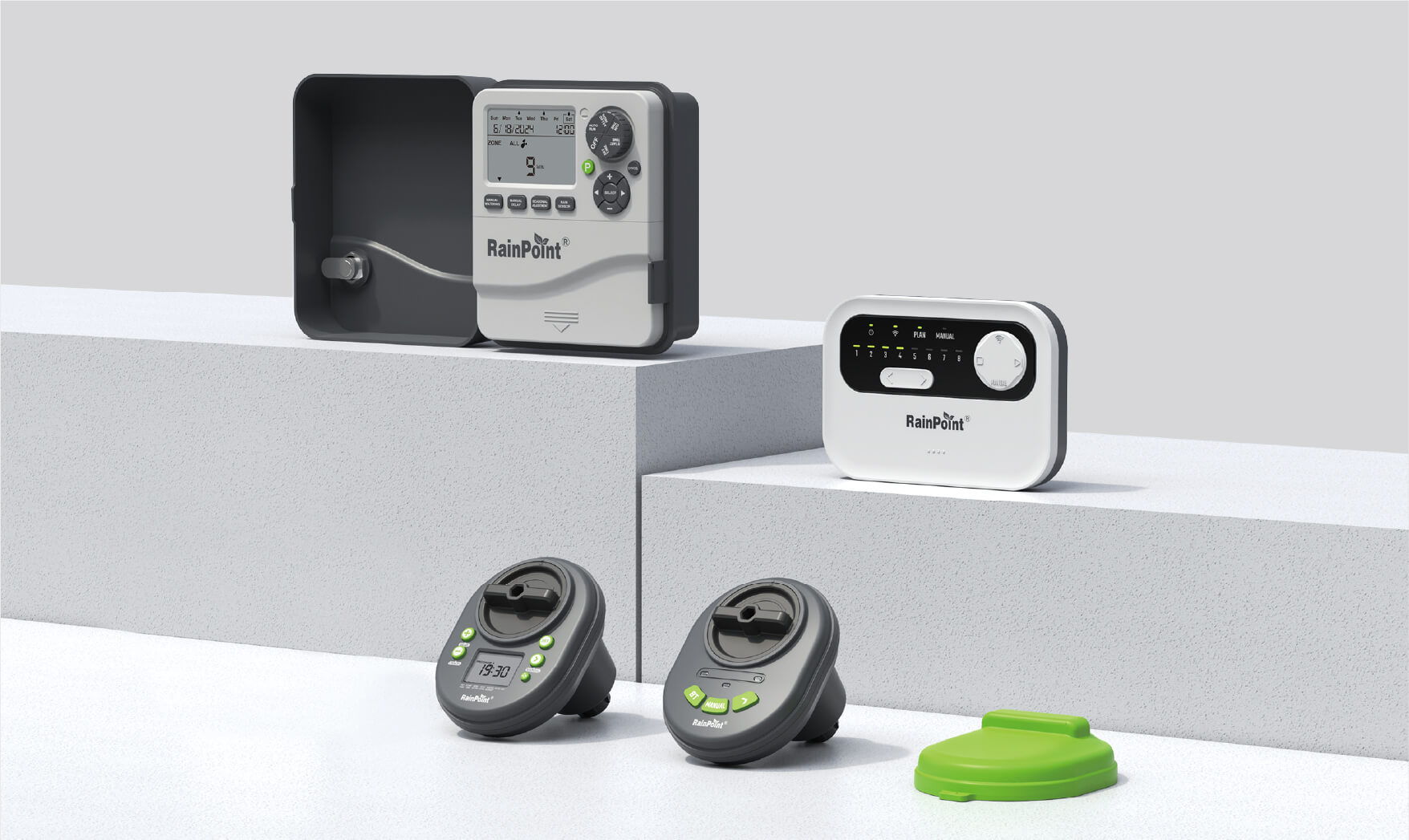 Devices on display, including a control panel and two remote units.