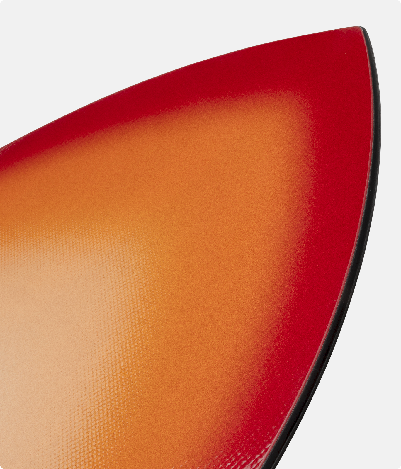 Close-up of a vibrant, gradient-colored snowboard edge.
