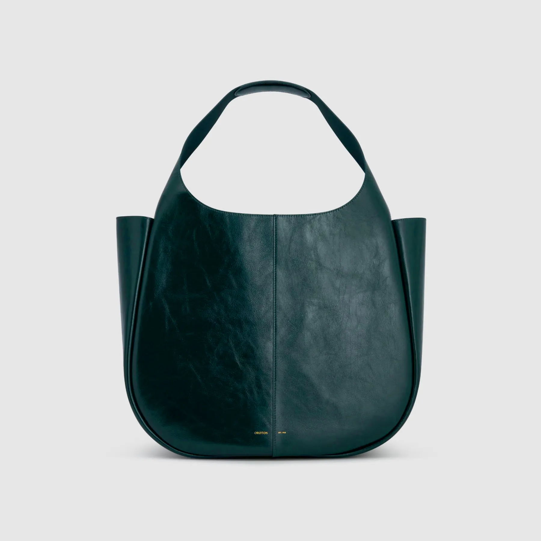 A dark green leather tote bag on a plain background.