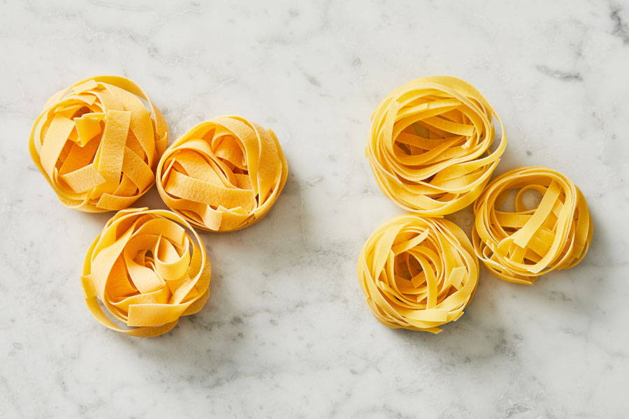 Pappardelle pasta compared to tagliatelle pasta