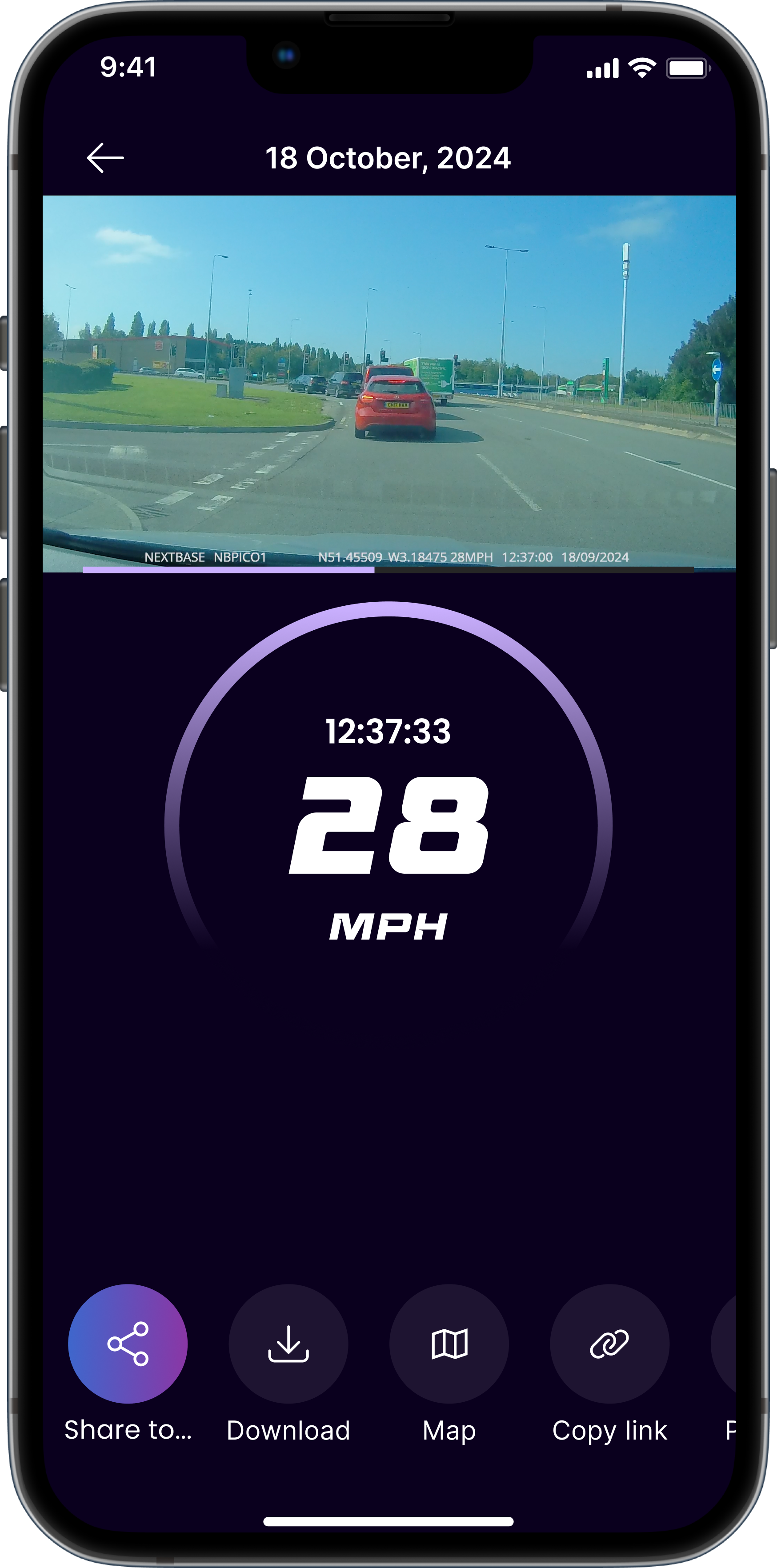 Car driving on a road with speed indicator showing 28 MPH.