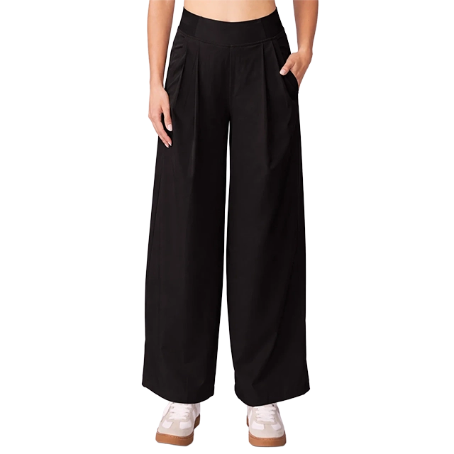 Black wide-leg pants with side pockets, worn by a model.