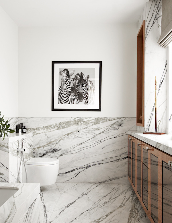 Modern bathroom with marble floor sand walls