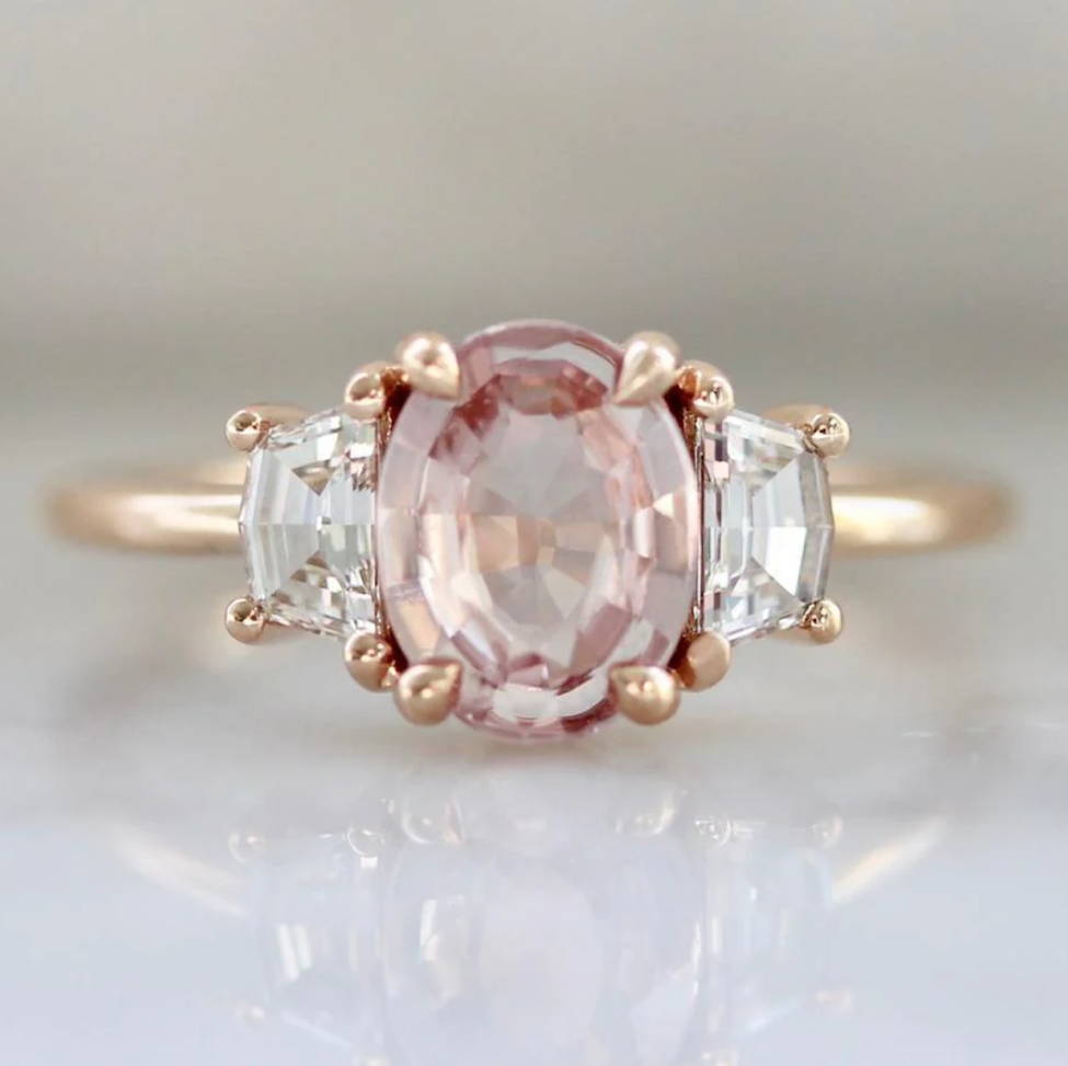 peach sapphire three stone ring in rose gold Gem Breakfast