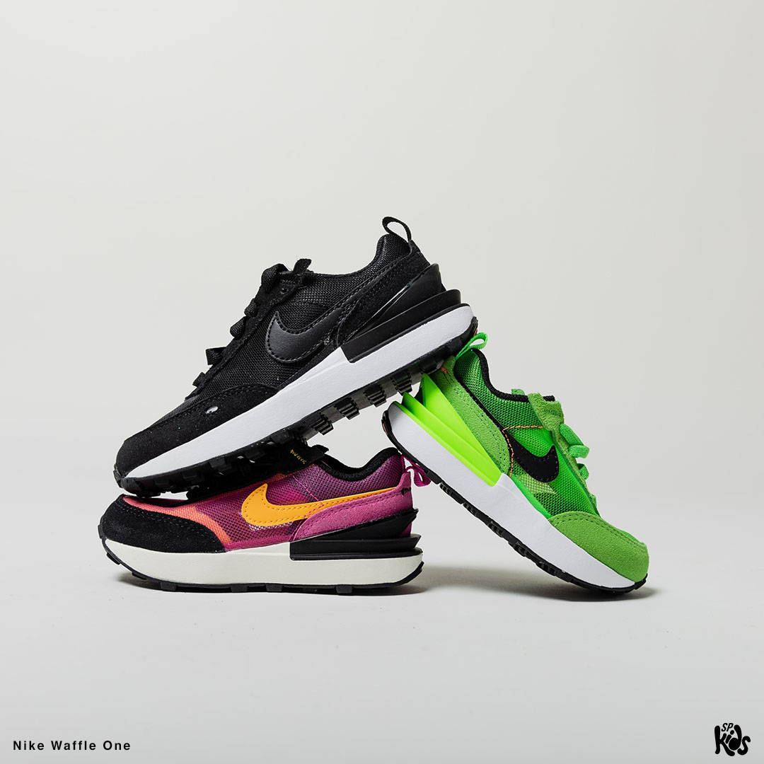 child size of black, electric green, and purple nike waffle one stacked