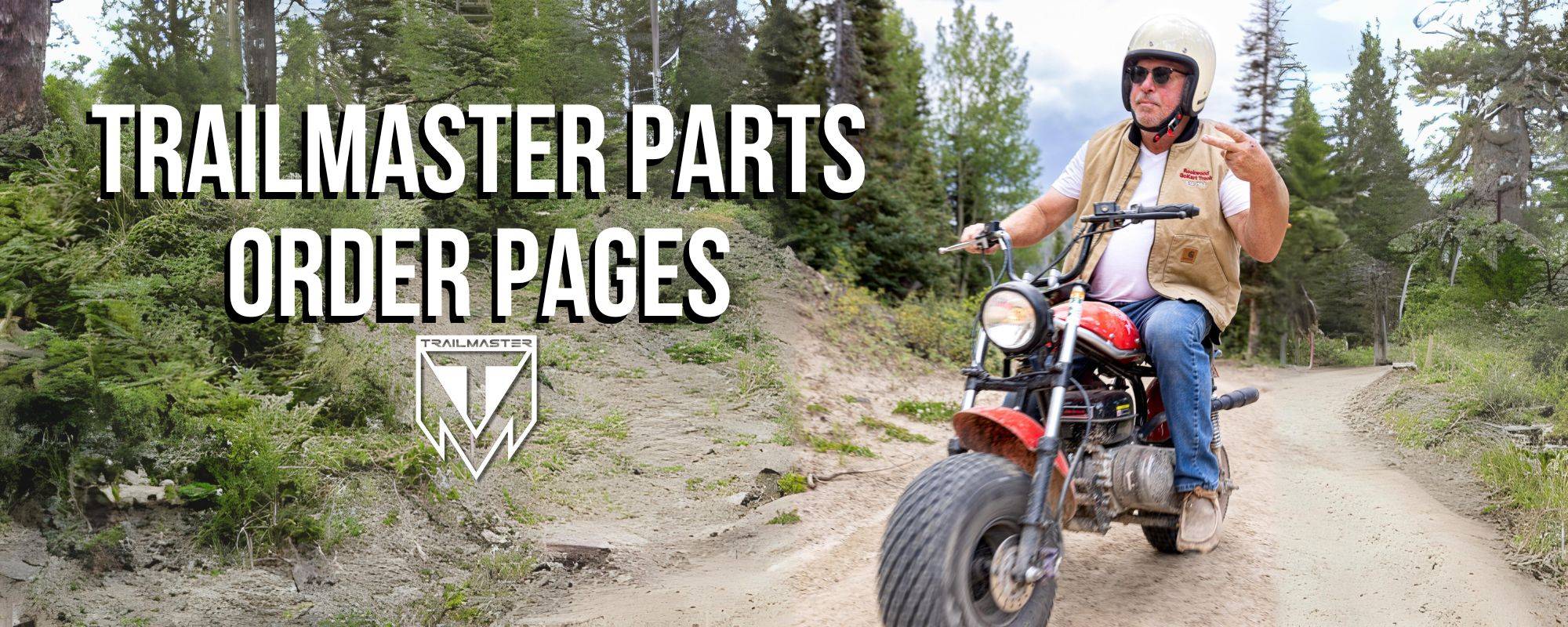TrailMaster Parts Order Pages. Tim Yochum on a TrailMaster MB200-2 Mini Bike with a Super Stage 1 Kit in the Colorado Mountains. Throwing up the peace sign as he rides.