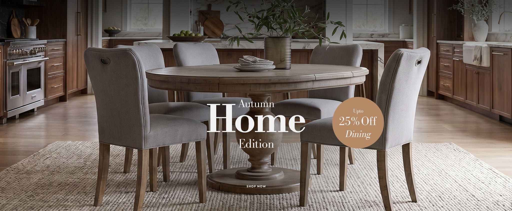 Dining room with a round oak table and grey chairs. 