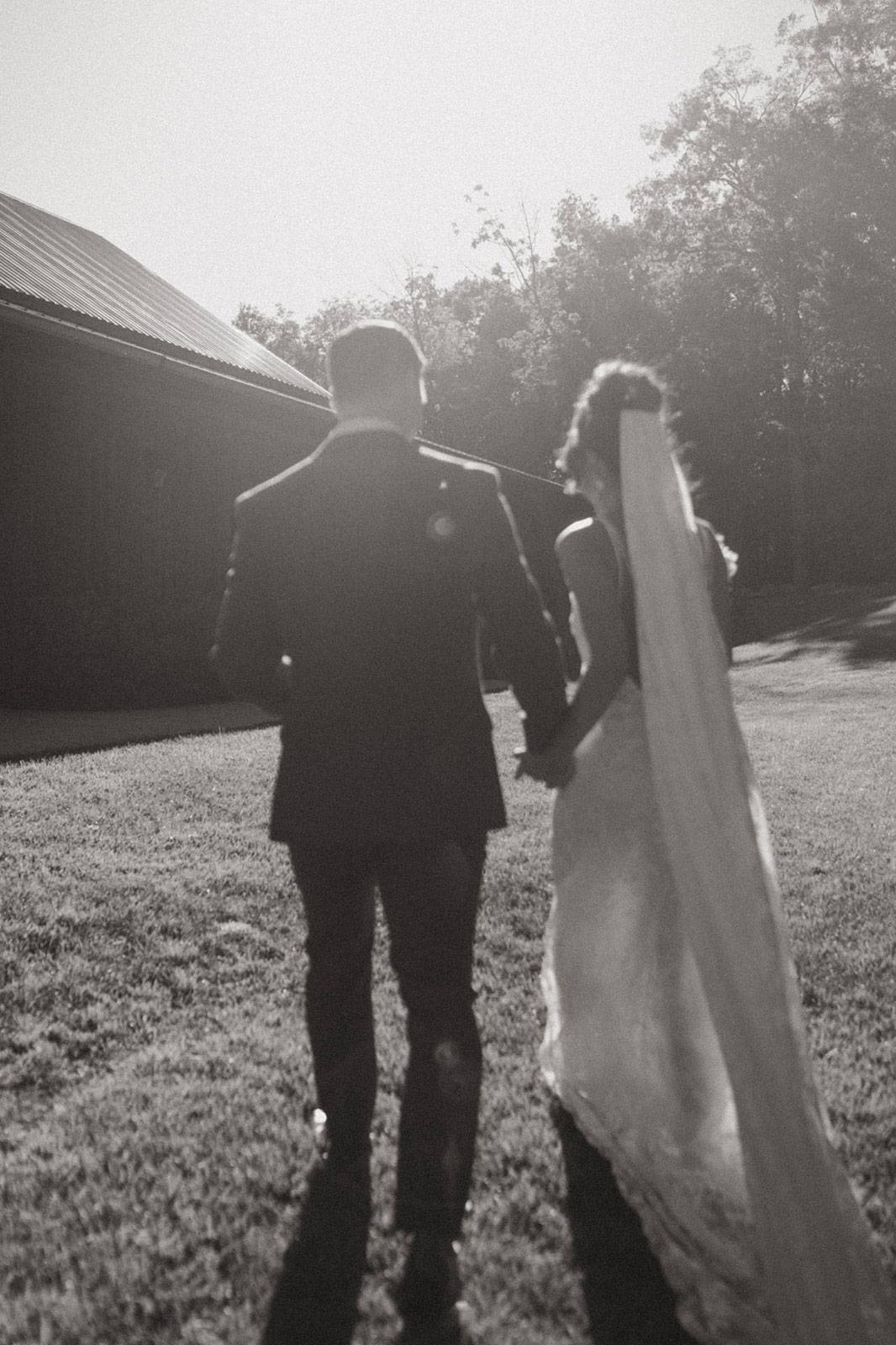 Bride and Groom holding hands