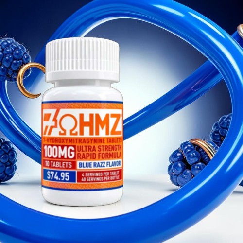 Bottle of dietary supplement with blue raspberry flavor against a blue background.