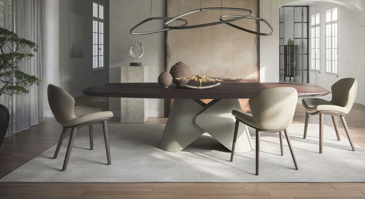 Modern dining room with a unique table and stylish chairs.