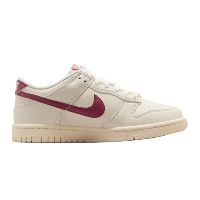 Nike Dunk Low sneaker in cream and maroon colorway.