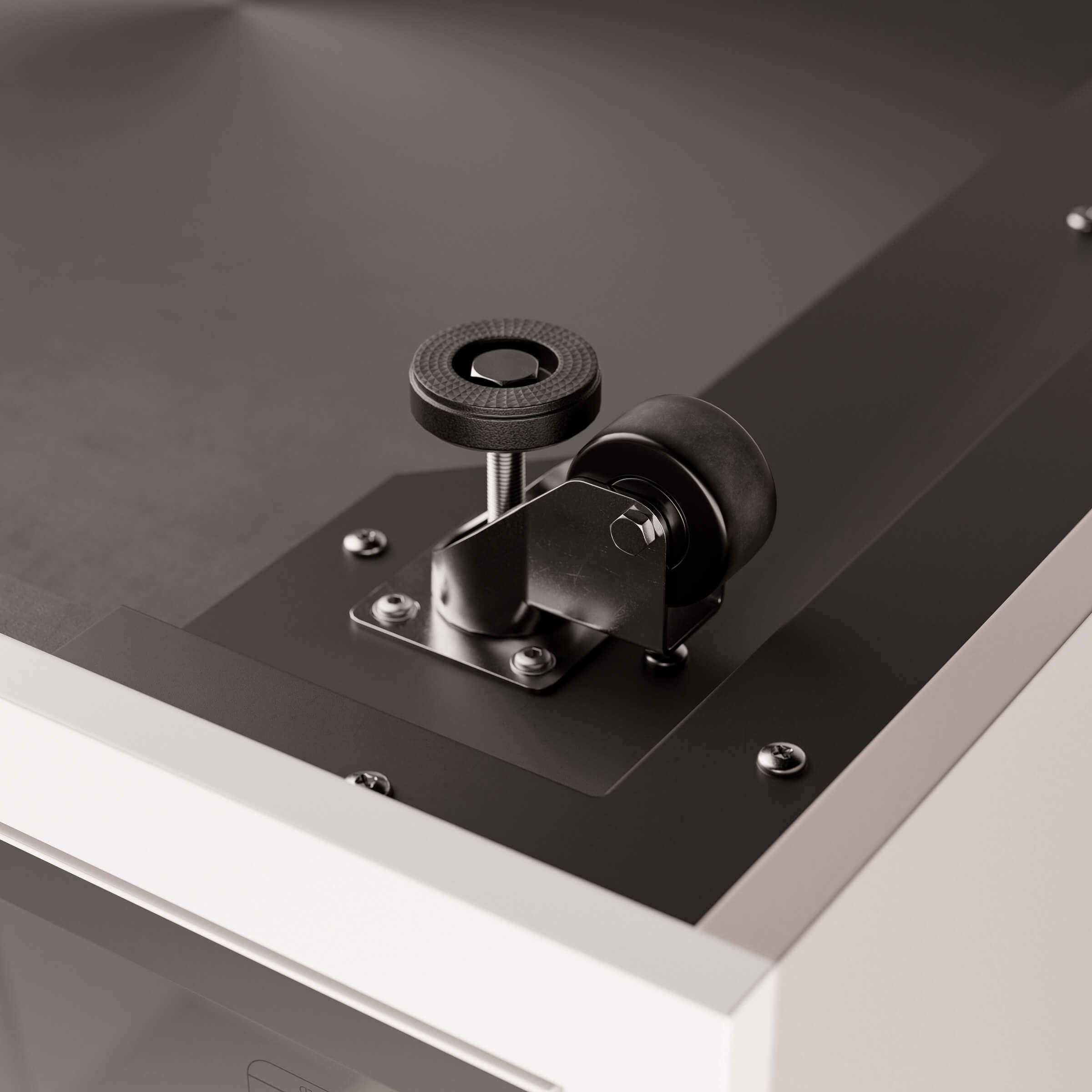 Close-up of the height-adjustable transport roller on the base of the ofinto Focus phone booth