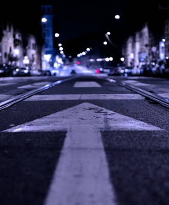 Pavement markings signaling the correct traffic direction.