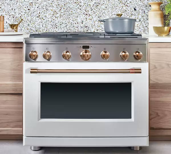 matte white range with brushed copper hardware