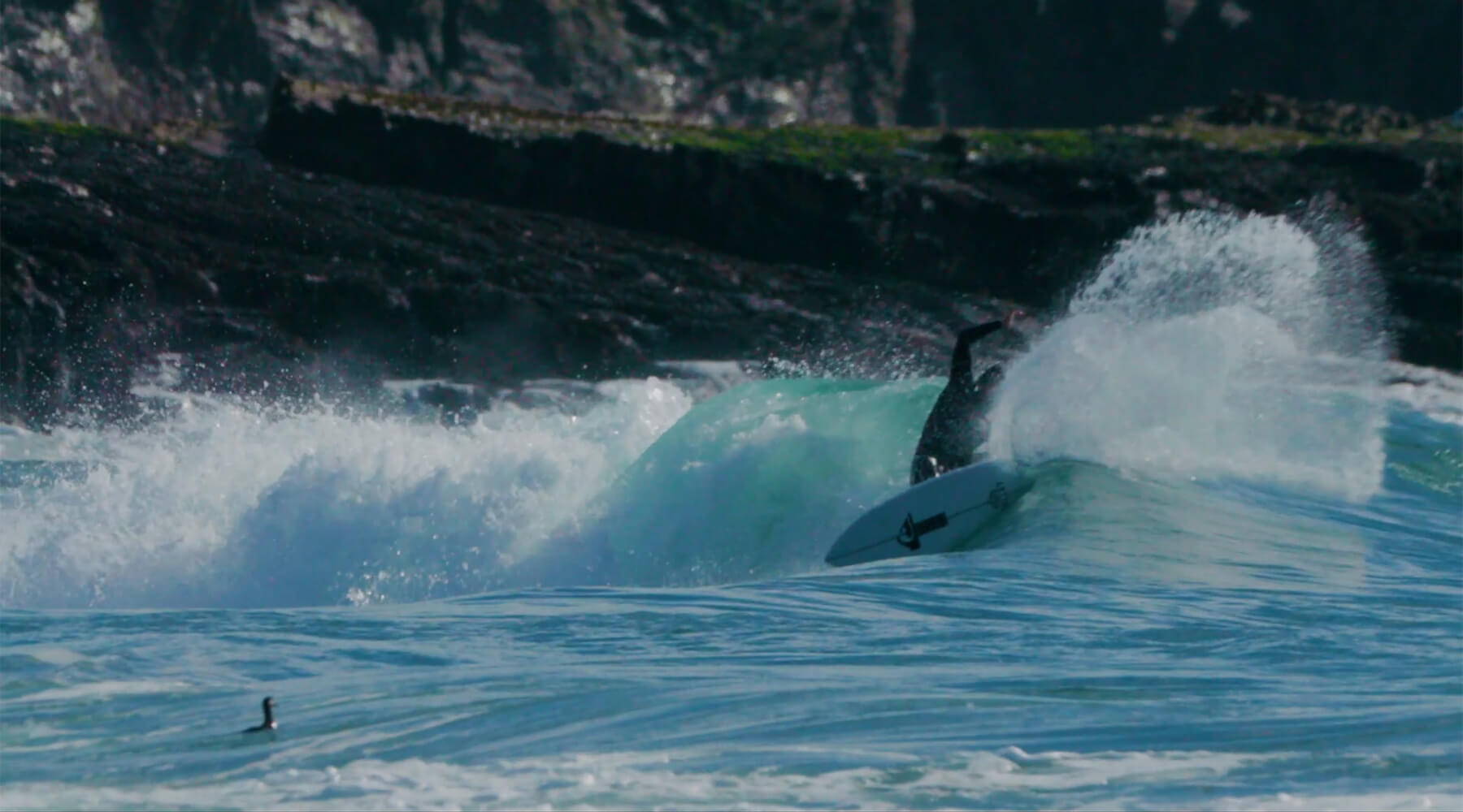 Noah Collins surfing