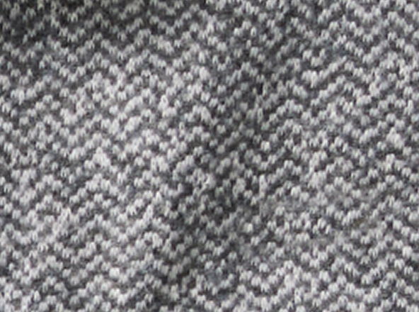 Close-up of textured gray herringbone fabric pattern.
