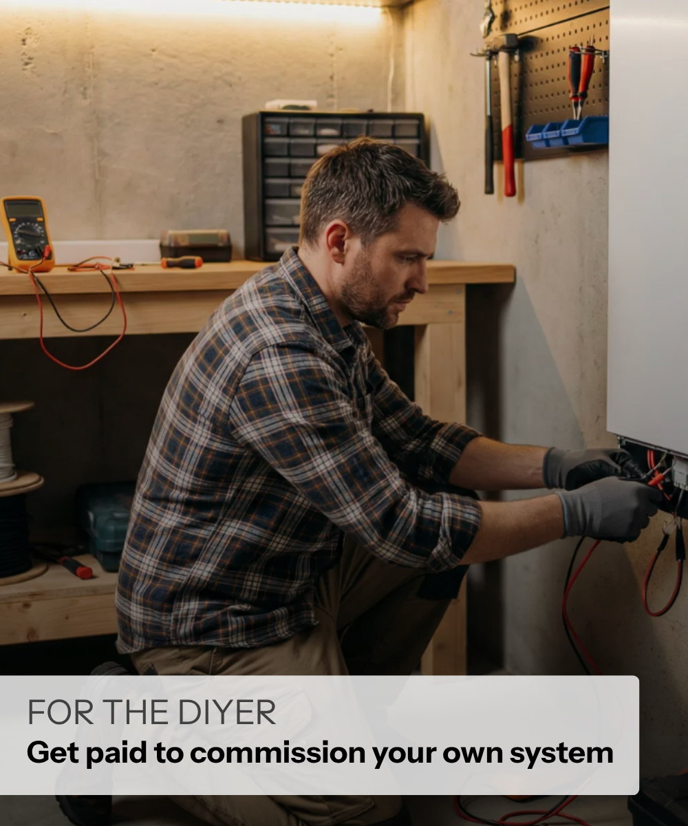 Man working with tools in a workshop, focused on a project.
