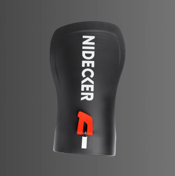 Black snowboard binding with Nidecker logo and red adjustment lever.