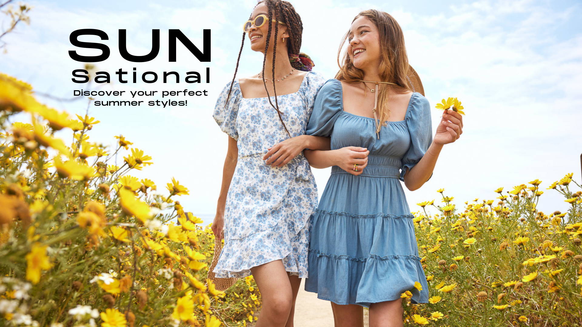 trixxi SUN-sational summer campaign with two girls walking in yellow flower field in a blue tier dress and a blue floral wrap ruffle dress.